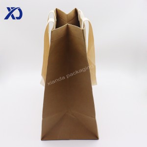 Handheld kraft paper bags