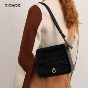Women’s leather handle crossbody bag