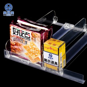 Kohandatud automaatne rull-riiulitõukur vedruga supermarketi plastist sigaretitõukurisüsteemi jaoks