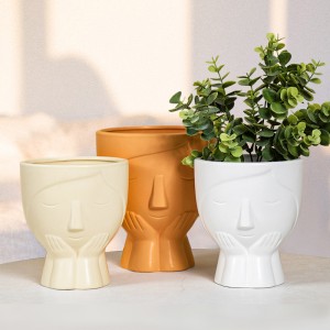 Vendita calda a buon mercato vaso di fiori in ceramica decorazione per interni sorriso viso testa di vaso di fiori