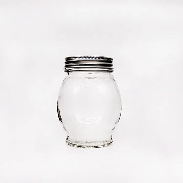 Διαφανή γυάλινα βάζα μελιού με μεταλλικό βιδωτό καπάκι