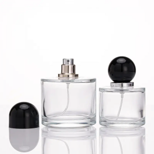 Bouteille en verre de parfum en forme de cylindre