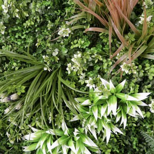 Πάνελ τοίχου από τεχνητά φυτά με φόντο μικτό γρασίδι για διακόσμηση εσωτερικών χώρων