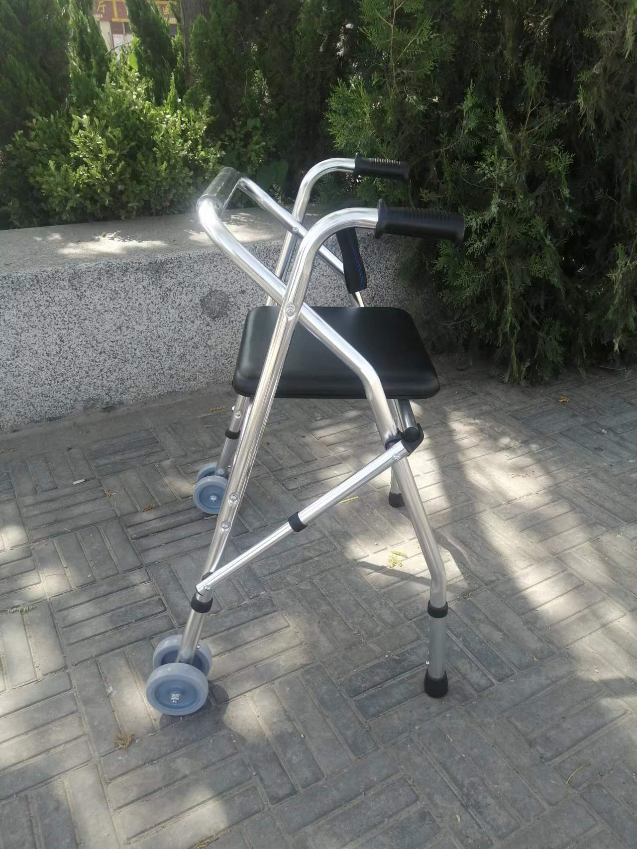 Walking aid with wheel and seat