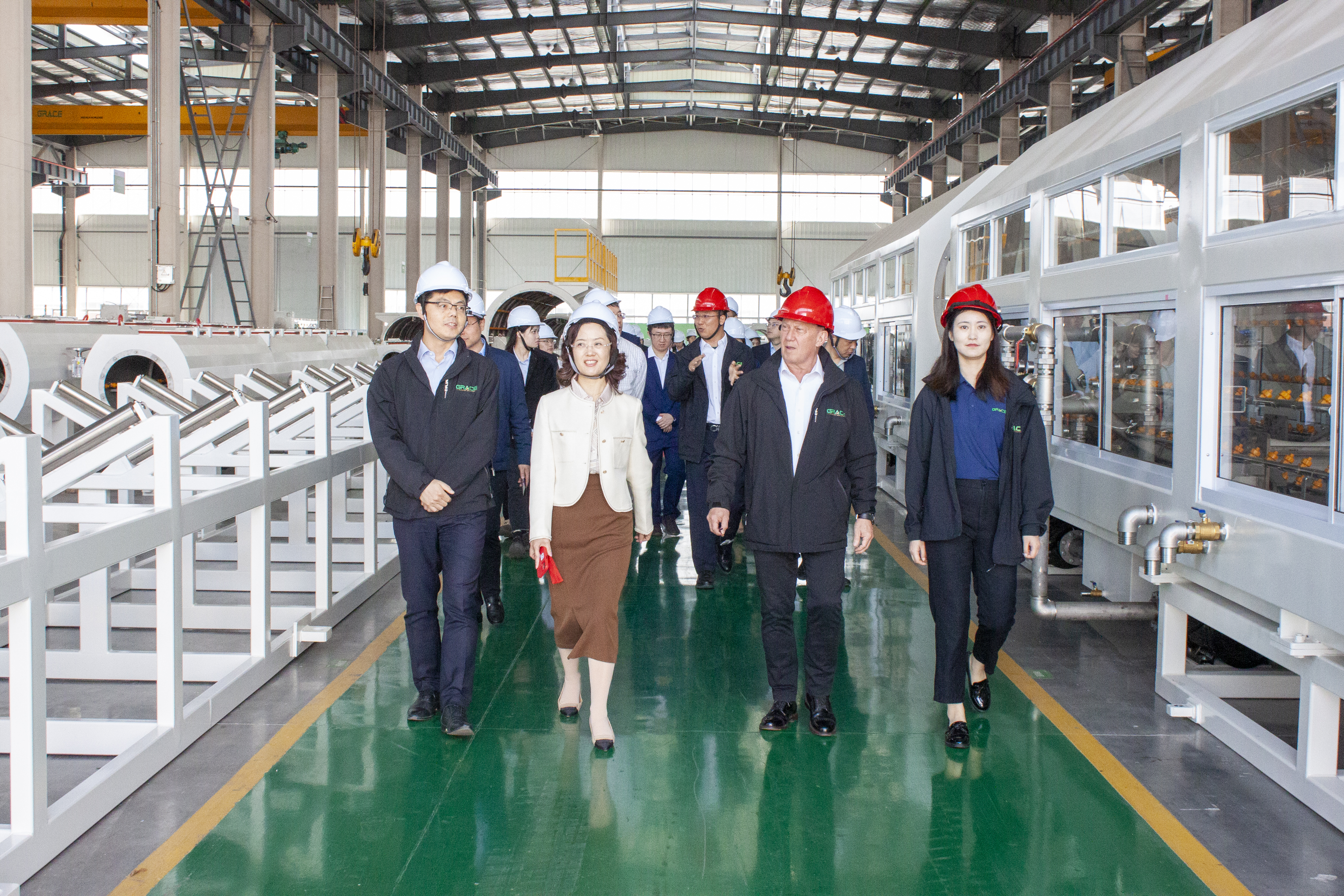 Li Qiuju, Director of Municipal Finance Bureau, and her delegation visited Grace