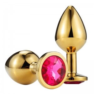 Experience the ultimate in luxury and pleasure with the Domlust Golden Butt Plug With Crystal Jewelry.