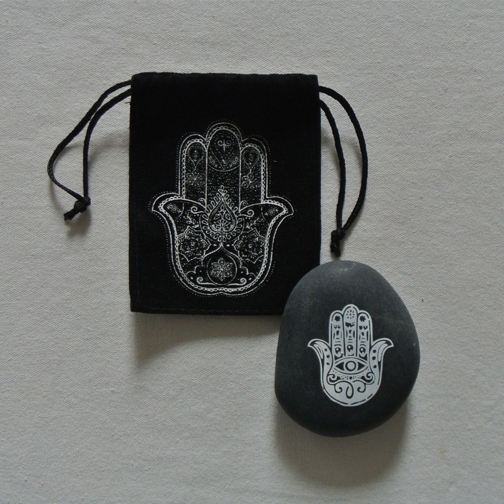 natural pebble stone with customized printing designs of hamsa hand black pebbles polish stone Featured Image