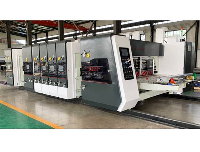 2021 China New Design Stack Flexo Printing Machine - Syk1224 4 Color Printing Slotting Die Cutting With Stacking Machine – Xinguang
