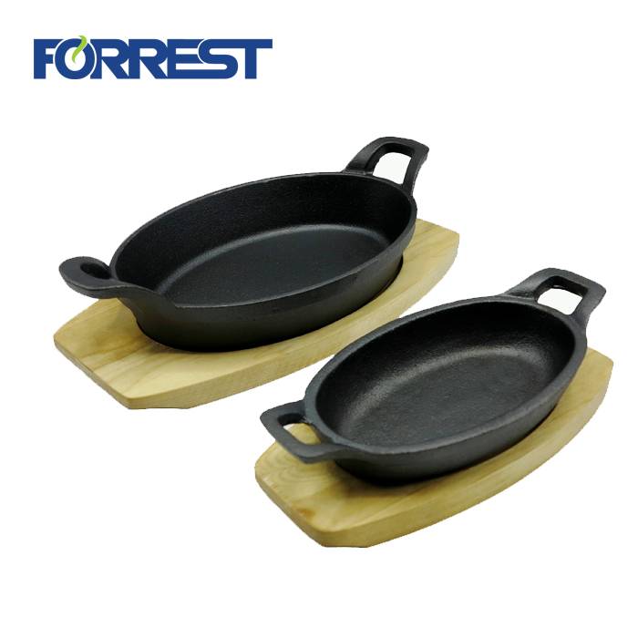 China OEM Cast Iron Round Handless Serving Griddle - Cast iron oval sizzle serving dish with wooden tray – Forrest