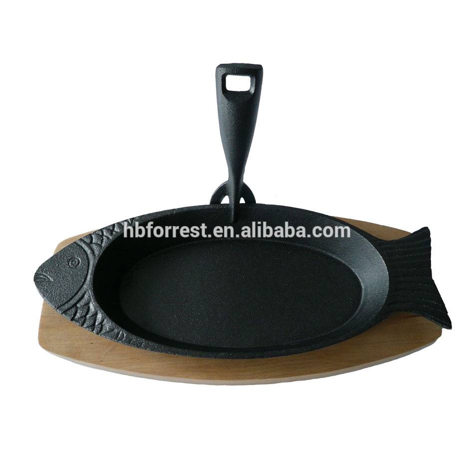 Cast iron fish plate with base and fork