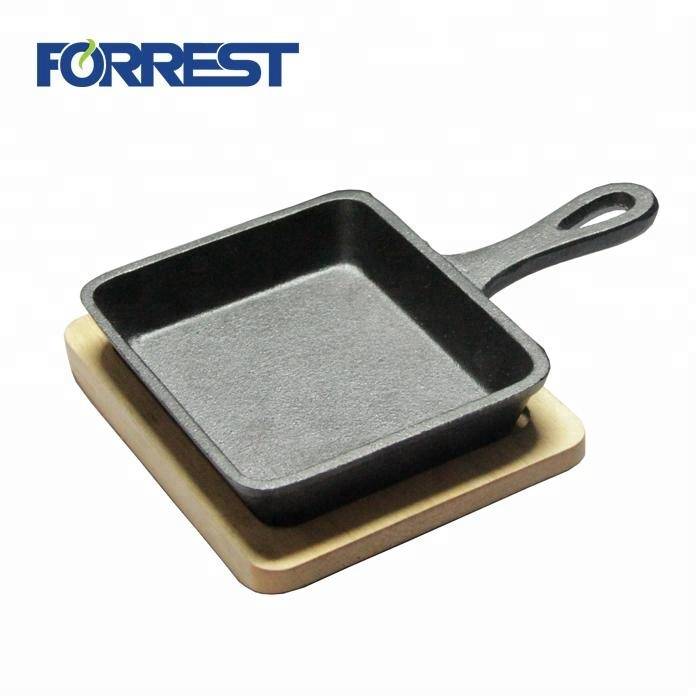 cast iron mini rectangular frying skillet pans with wooden tray Featured Image