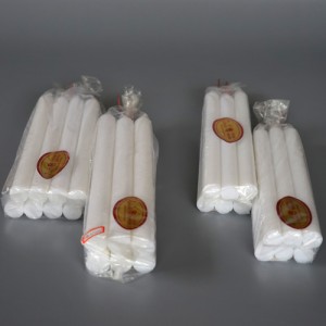 Bright white household candles with bag package