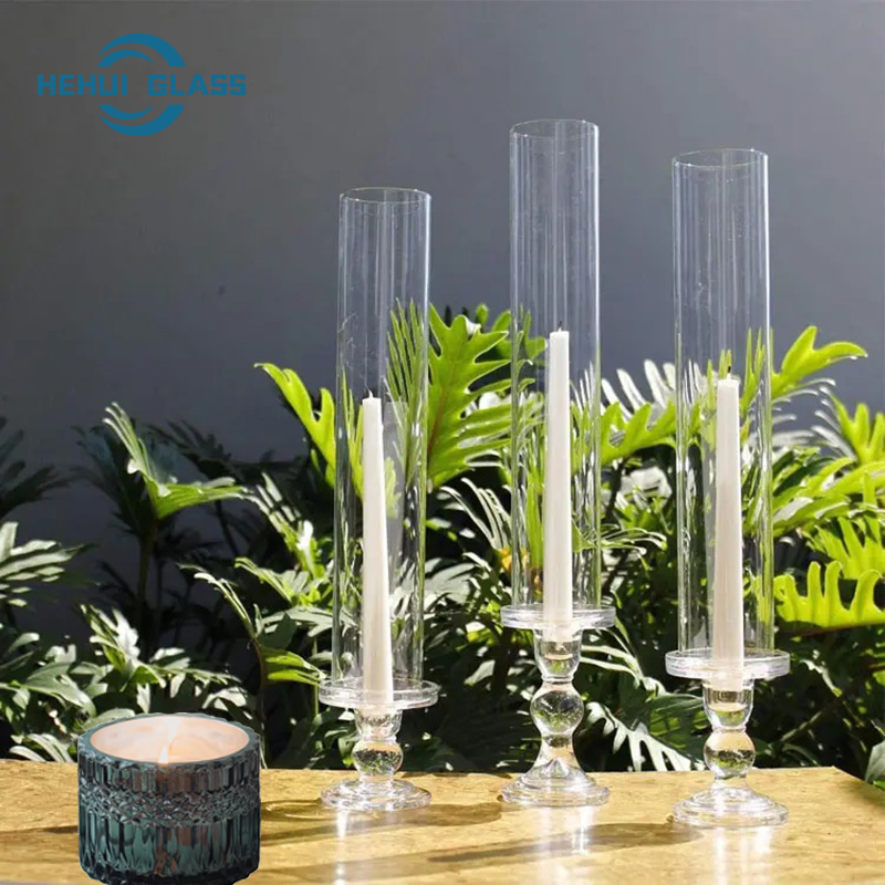 Illuminate your space with elegant glass hurricane tube candle holder.