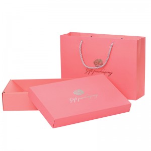 Luksuslik hõbedane tembeldatud valge papppaberikarp Kena kvaliteetne naisteriiete pakend