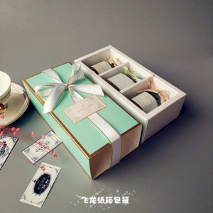 Boîte de luxe de tiroir de glissière de cadeau de logo d'or imprimée par couleur avec le ruban