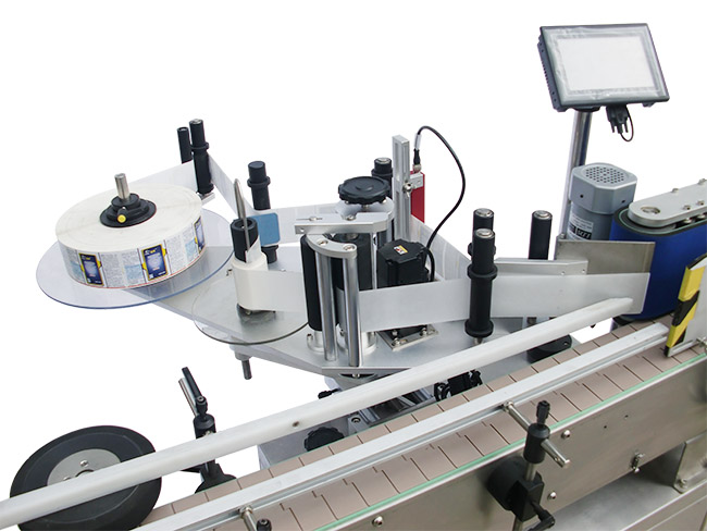 How does the labeling machine apply the label to your product?