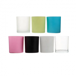 Colorful glass soy candle jars with metal and wooden bamboo lids