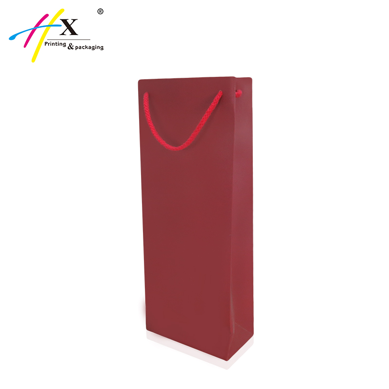 Red fancy paper bag for wine packing