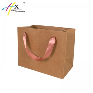Brown kraft paper shopping bag with rose gold logo