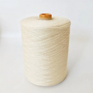 Cotton-covered polyester sewing thread