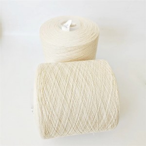 Cotton-covered polyester sewing thread