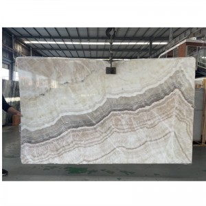 Seres Gris Onyx bookmatched Slab in Wall et Solum