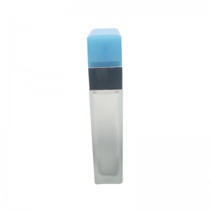 Minimalist design empty frosted white glass blue plastic cap perfume bottle with sprayer