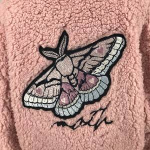 Embroidered sherpa fleece jacket