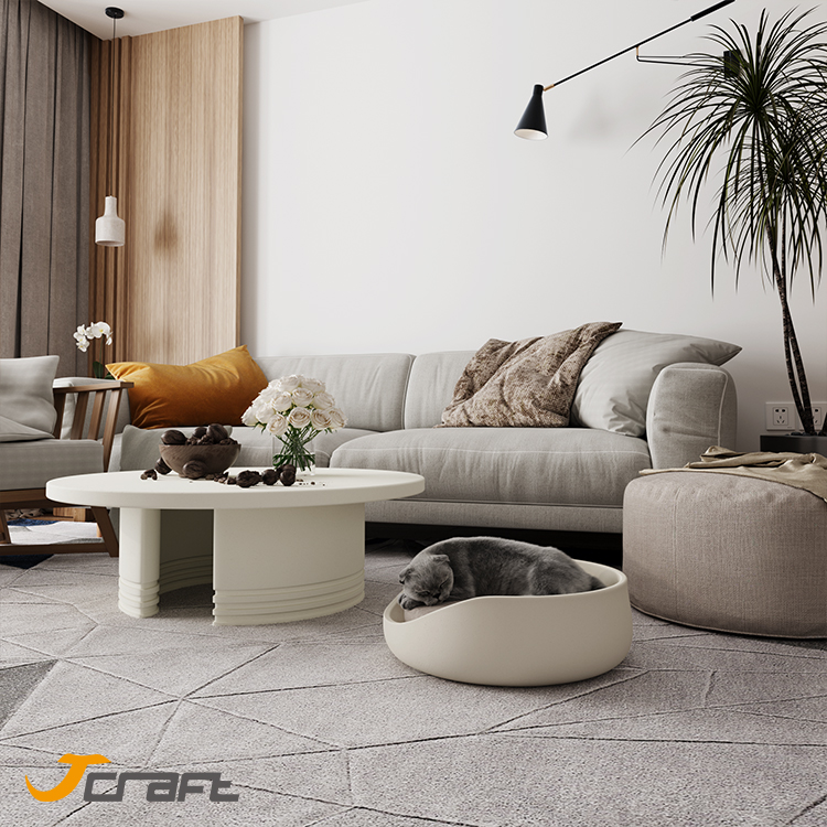 living room round white concrete coffee table