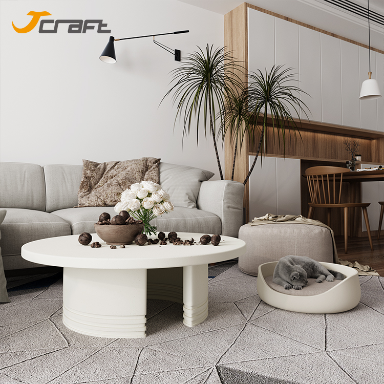 living room round white concrete coffee table
