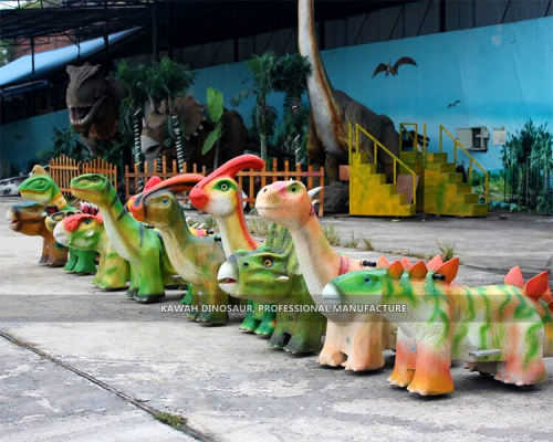 Kiddie dinosaur rides ready to transport to amusement park in Romania Europe