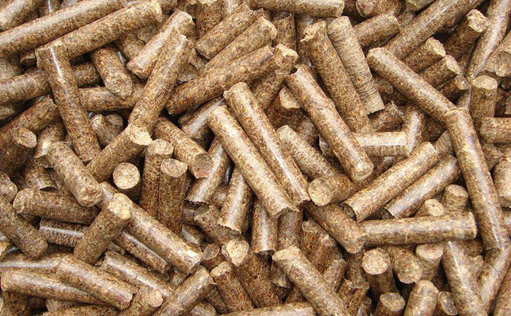Why does the biomass pellet machine smell different after the pellet fuel is burned?