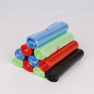 HDPE star-sealed trash bag on roll in multi colors.