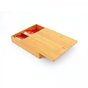 O cutie de depozitare din bambus cu capac poate stoca plicuri de ceai și cafea