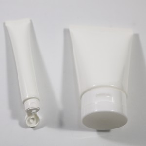 Plastová tuba pro balení kosmetického pleťového krému se stlačovací tubou s odklápěcím uzávěrem