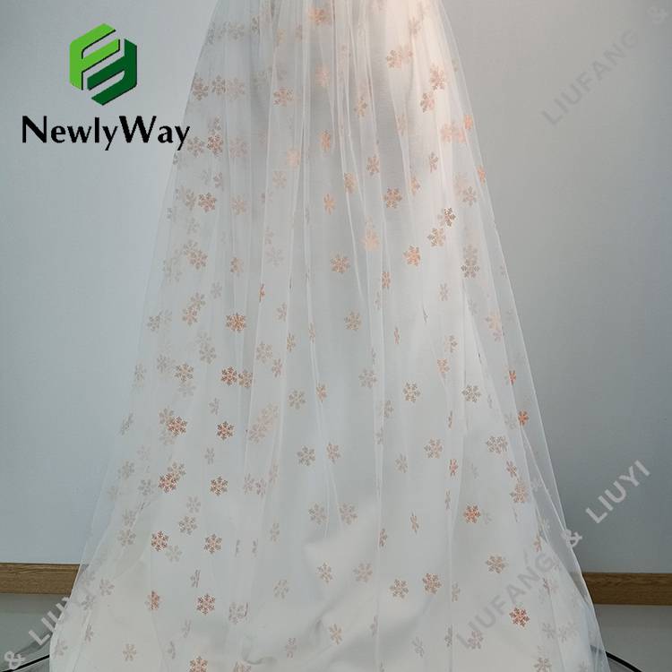 Manufacturing Companies for Flocking Tulle Fabric - Snowflake pattern sheer white nylon tulle for children’s skirts – Liuyi