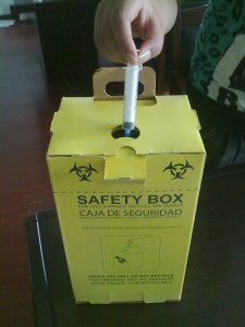 Safety box for needles/syringes