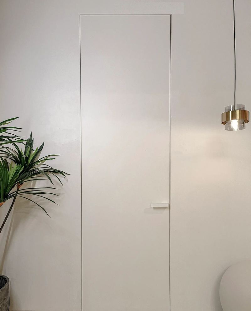 Osynlig dörr för stilfull minimalistisk modern i...