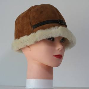 ladies sheepskin cloche hats feature a leather belt