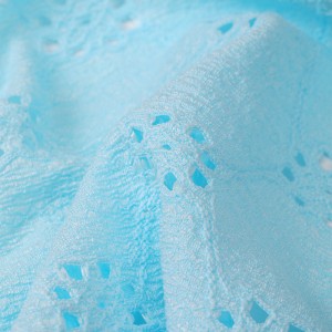 Professional garment wholesale textiles eyelet design knitted jacquard stretch lace fabric for dress