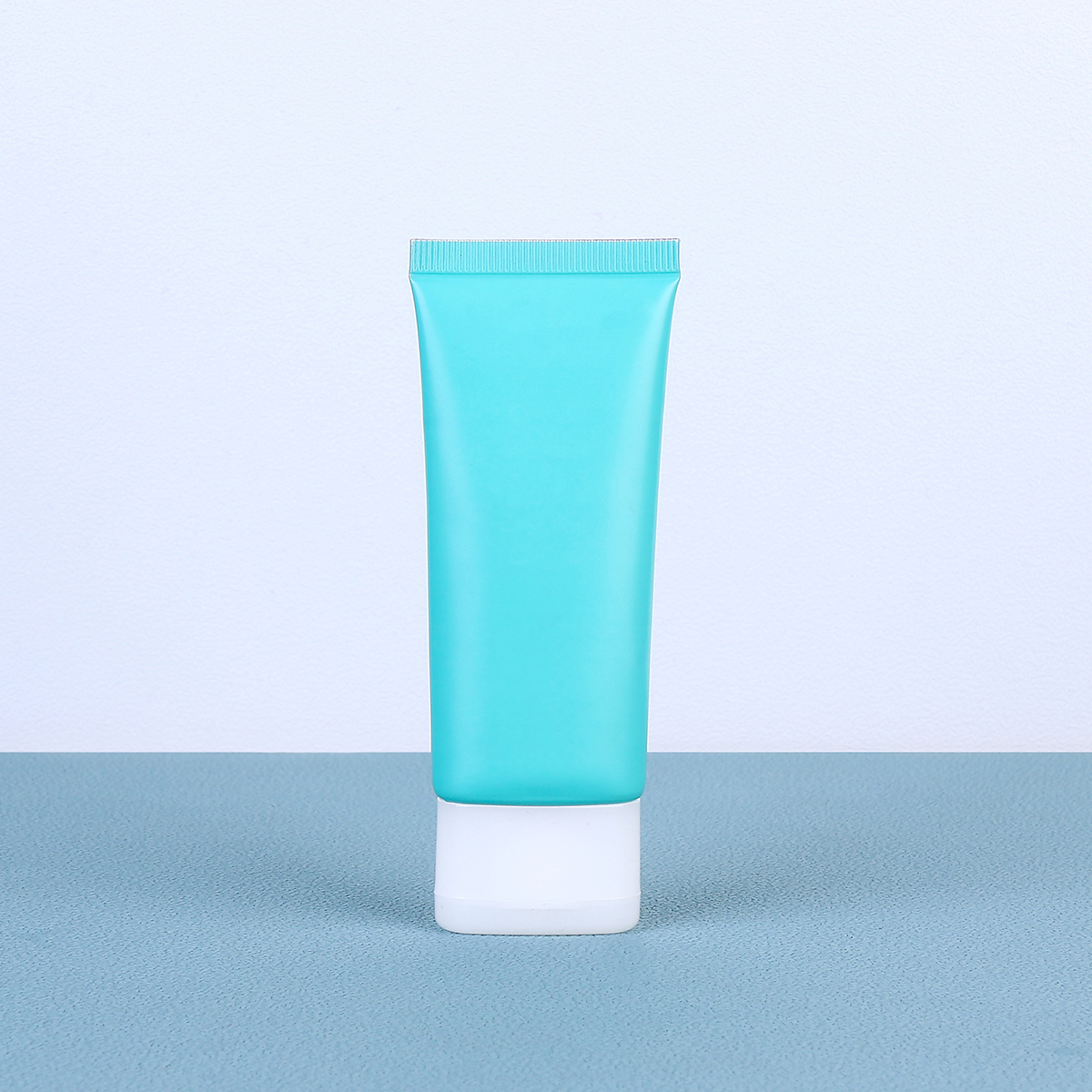Custom Blue 1 oz 30ml empty flat soft squeezable tube flip top lid for foundation hand cream