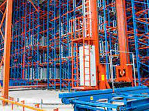 Automated pallet shuttle with crane stacker