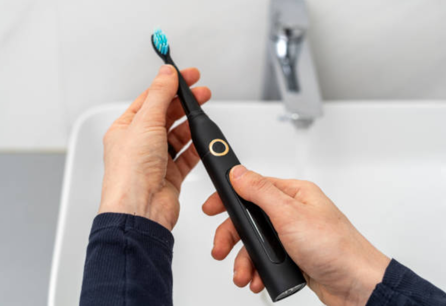 What are the pros and cons of an electric toothbrush?