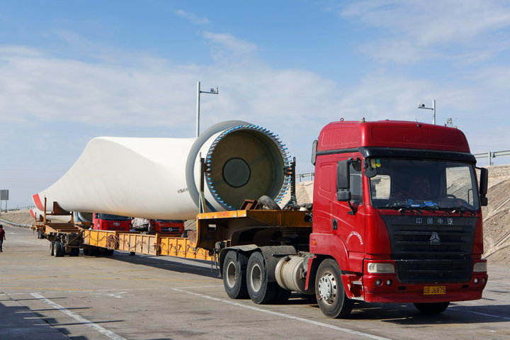 To transfer wind turbine blade with our manufactured extendable trailer