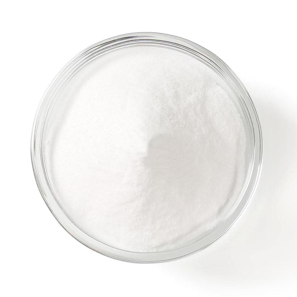 bowl of sodium bicarbonate on white background
