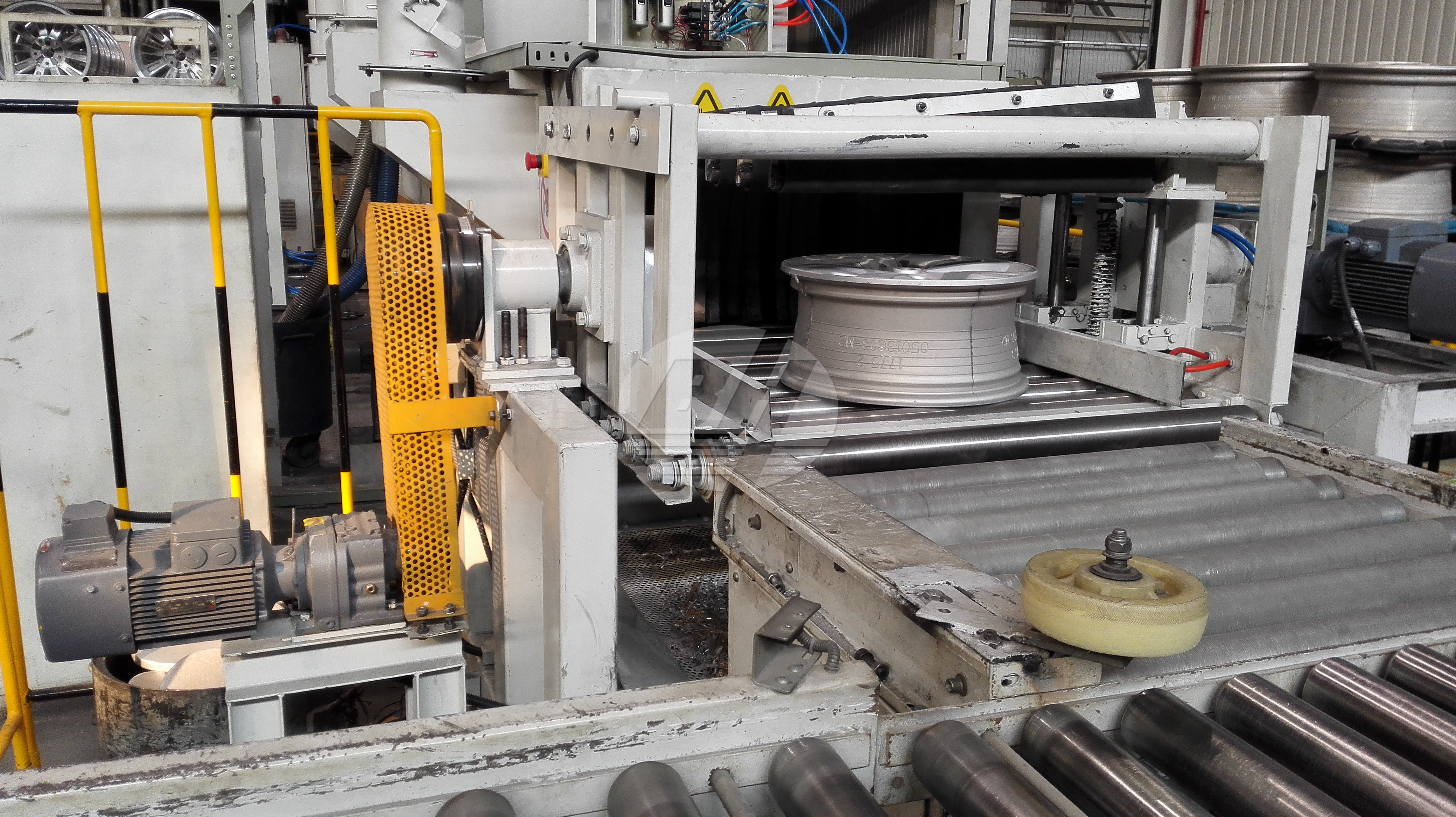 BHJC Machinery designed the Q69 Roller Conveyor Shot Blasting Machine for the customer producing wheel band (2)