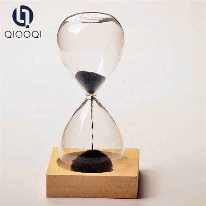 Magnetic hourglass with wooden base