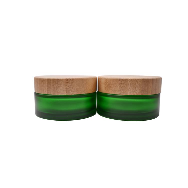 RB-B-00186 Tarro de cristal verde de 100g con tapa de bambú