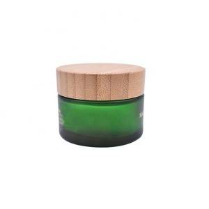 RB-B-00187 žalias stiklainis su bambukiniu dangteliu + medinės dėžutės pakuotė su sagtimi