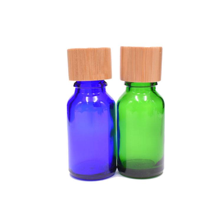 Chinese wholesale Glass Bottle With Bamboo - RB-B-00028 bule essential oil bottle with bamboo screw cap – Rainbow